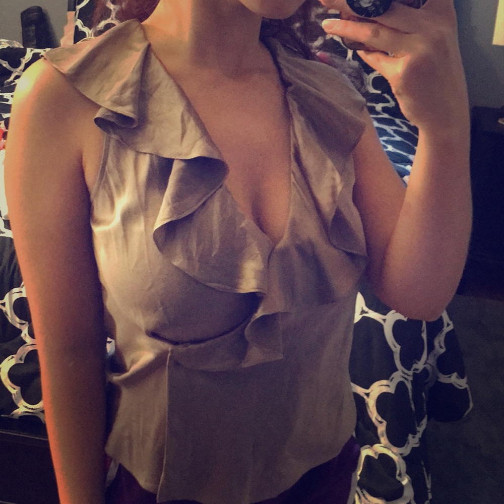 Silk beige sleeveless blouse